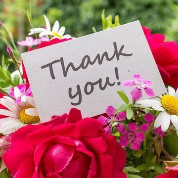 Vibrant thank you flower bouquet with roses, lilies, and eucalyptus from Well Live Florist, Singapore.