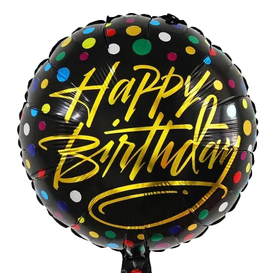 A round black foil balloon with colorful polka dots and metallic gold 'Happy Birthday' lettering