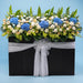 Boundless Grace condolence flower stand, blue and white sympathy flowers Singapore