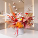 Fortune Beckons dried flower arrangement 50cm by 60cm in white box with preserved roses