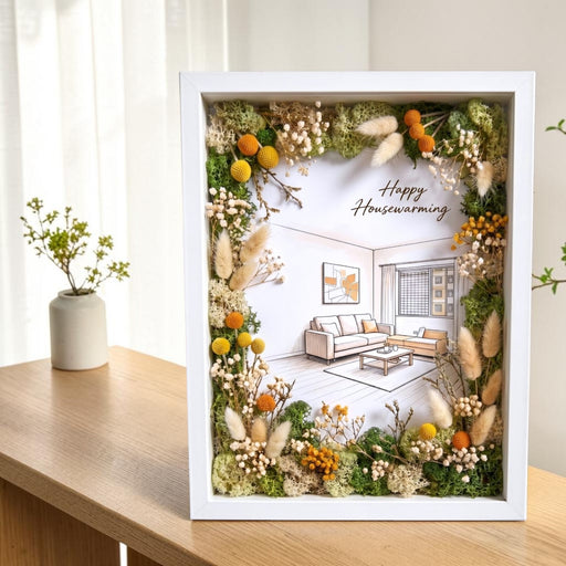 Handcrafted preserved flower photo frame with mixed pastel blooms in a wooden frame, perfect for new home decor.