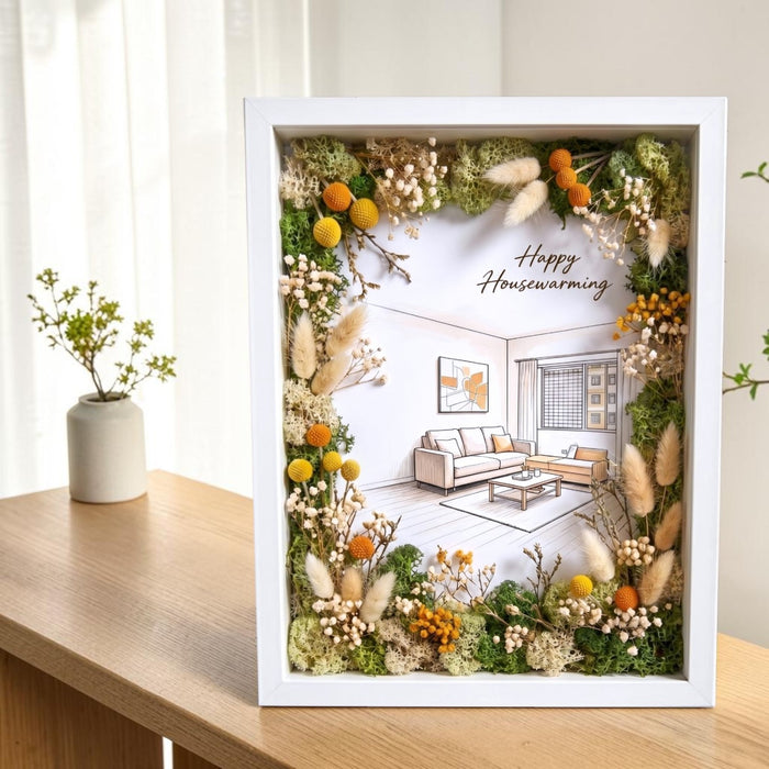 Handcrafted preserved flower photo frame with mixed pastel blooms in a wooden frame, perfect for new home decor.