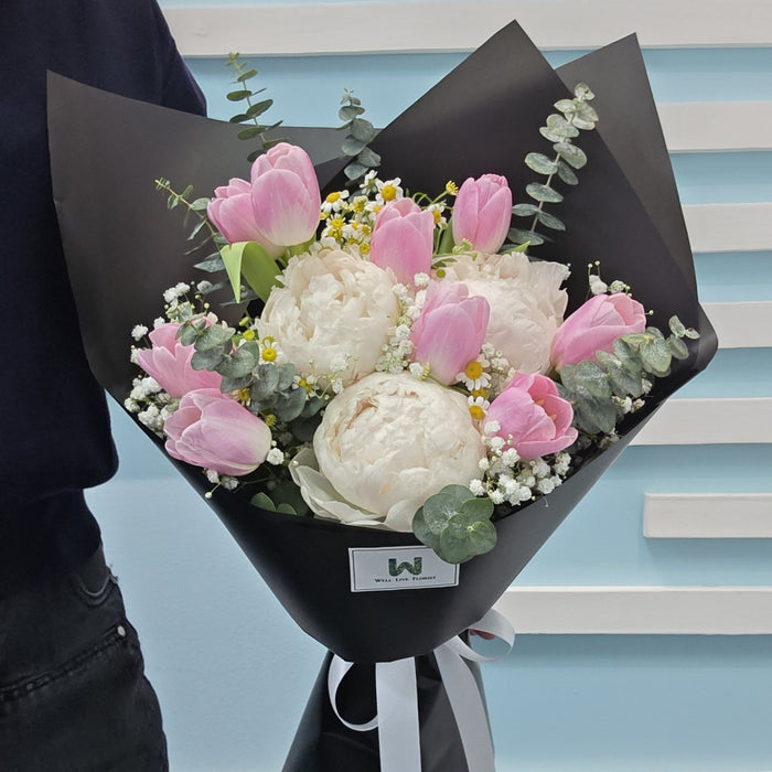 Premium fresh flowers arranged for same-day delivery across Singapore