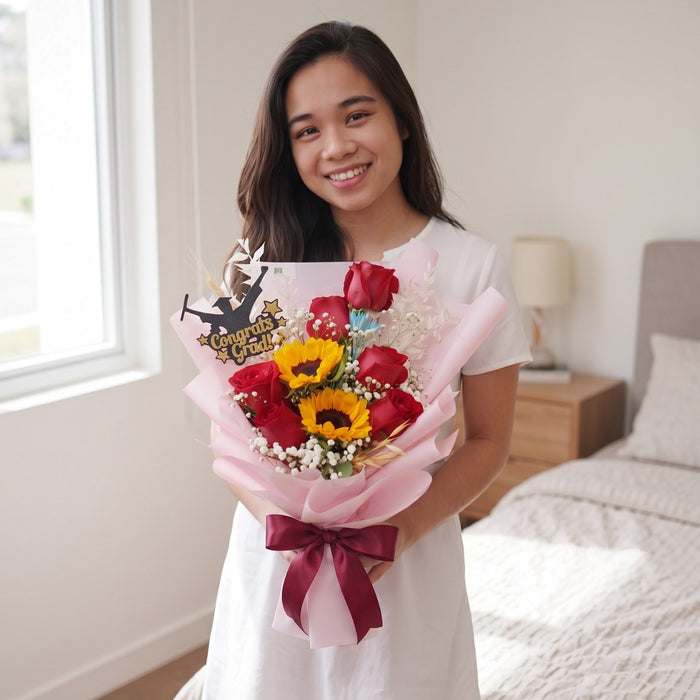 Congrats Grad tag on sunflower and red rose bouquet Singapore