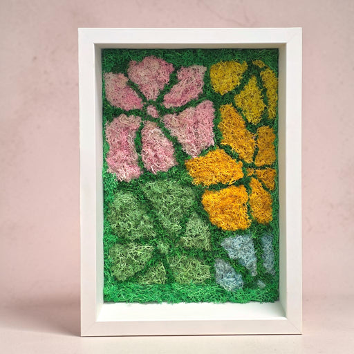 Close-up of preserved moss and botanical elements in the Whimsical Bloom Moss Frame, showcasing the natural texture and vibrant green tones of the carefully arranged moss art.