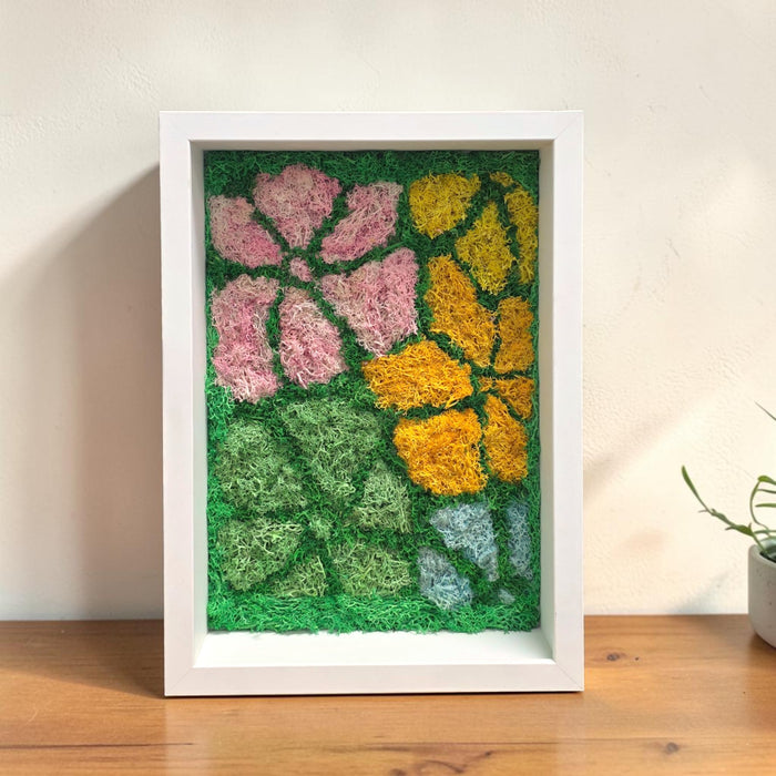Detail shot of the customized acrylic front with personalized sticker wording, showing how names, dates, or meaningful messages can be added to create a unique, gift-ready moss art frame.