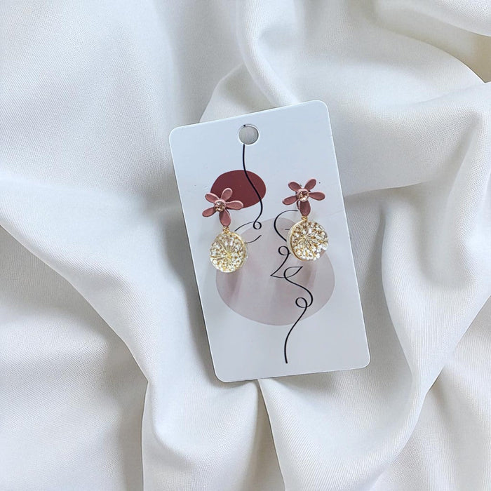 Dried Dandelion Stud Earrings. A delicate add-on to your flower bouquet. Perfect gift from Well Live Florist, Singapore.