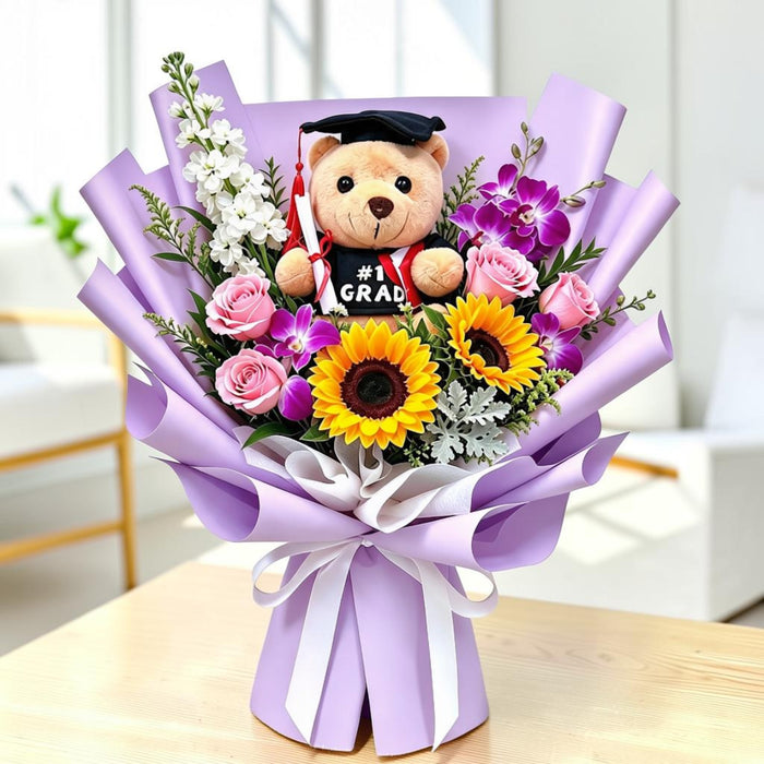 Sunflower, rose and orchid graduation bouquet with teddy bear, lilac wrap