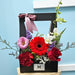 Well Live Florist Bold Delight flower box with red gerberas, roses, carnations, pink eustoma, and white orchids.