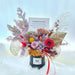 Well Live Florist preserved flower bloom box with roses, hydrangea, and foliage for a grand opening celebration.