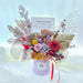 Well Live Florist grand opening flower bloom box with preserved roses, hydrangea, and foliage in a lilac gift box.