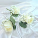 stunning white rose, baby's breath and green foliage.