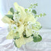 Graceful hand bouquet of beautiful white calla lily, matthiola and Foliage