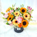 Captivating flower box of cheerful fresh sunflower, gerbera, rose, Eustoma, baby breath, filler and foliage.