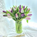 Magnificent table arrangements of 30 mix-coloured exquisite tulips.