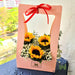 Fresh cut sunflower with baby breath and foliage in flower box