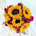 hand bouquet of sunflower and red roses.