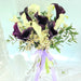 Graceful hand bouquet of beautiful 12 white / purple calla lily, wax flower and foliage