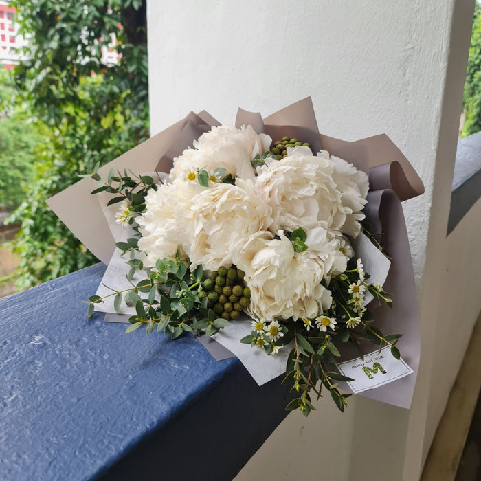 Mesmerising hand bouquet of alluring fresh White Peonies