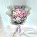 Luxurious hand bouquet of enthralling preserved roses, hydrangeas, cotton and dried foliage.