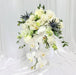 Exquisite hand bouquet of enticing roses, eustoma, Phalaenopsis orchid, mathiola and foliage.