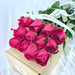 12 Delightful fresh-cut long stemmed red roses,