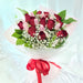 Irresistible hand bouquet of 12 elegant fresh stalk roses, tulips, baby's breath, and foliage