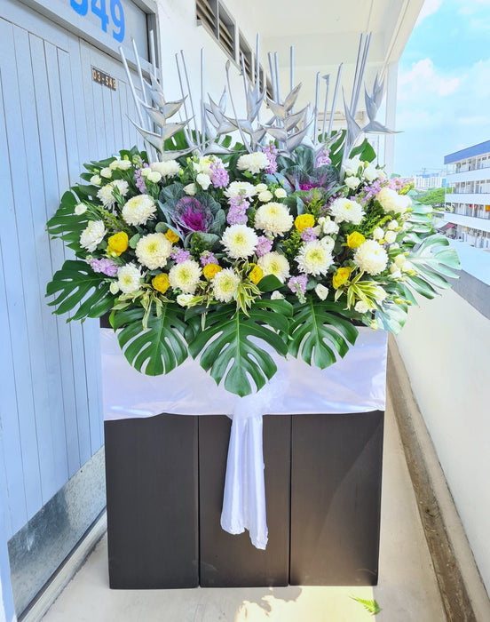 Fresh flowers beautifully arranged that will bring a feeling of peace and serenity to the funeral service.