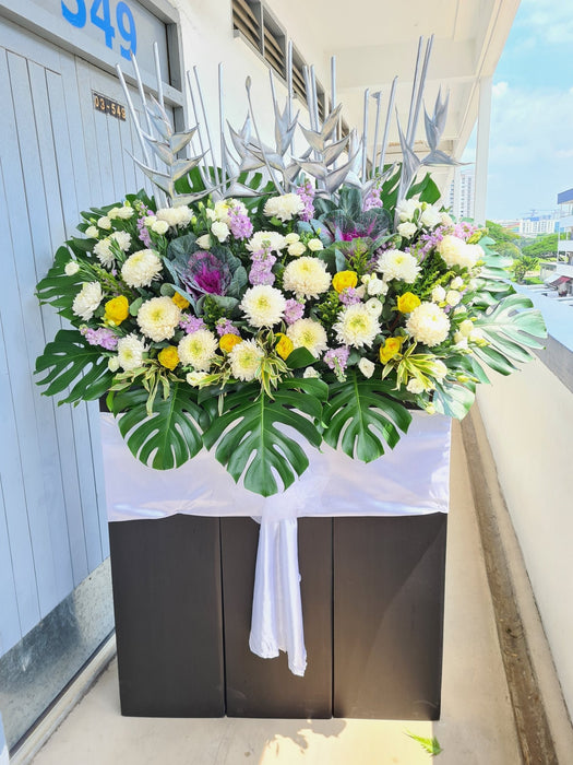 Fresh flowers beautifully arranged that will bring a feeling of peace and serenity to the funeral service.