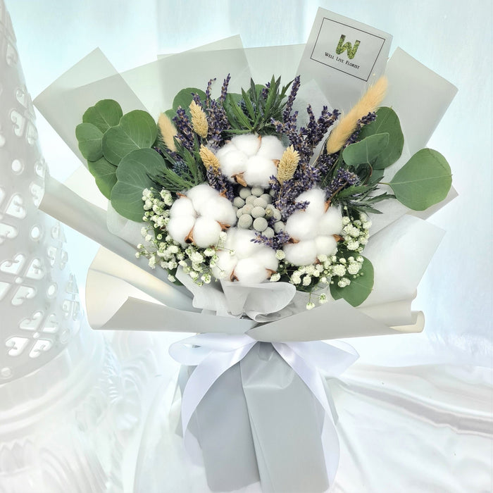 hand bouquet of elegant fresh lavender, cotton, baby's breath and foliage